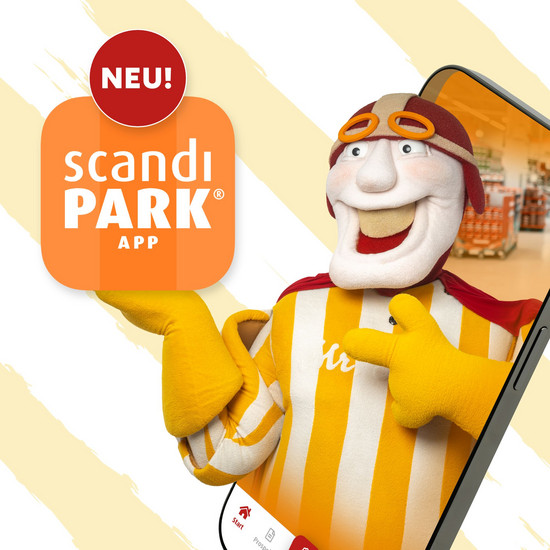 App für mehr Einkaufsspaß Mr Scandi hält das ScandiPark Logo
