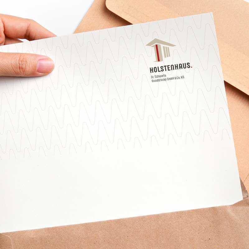 Weißes Papier mit Holstenhaus Logo