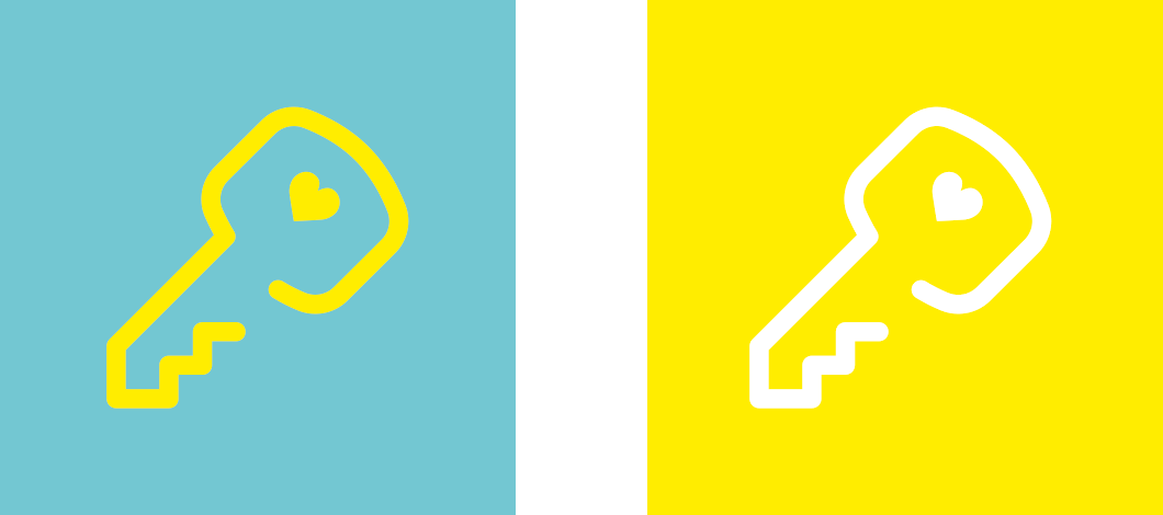 immobilien-duo-14-15.png gelber und weißer Schlüssel mit Herzloch