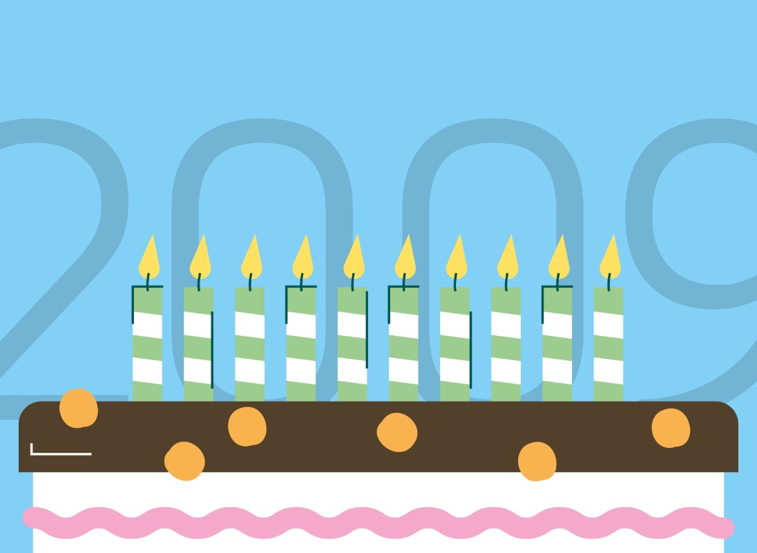 Blauer Hintergrund mit Jahreszahl 2009 und Geburtstagstorte mit Kerzen