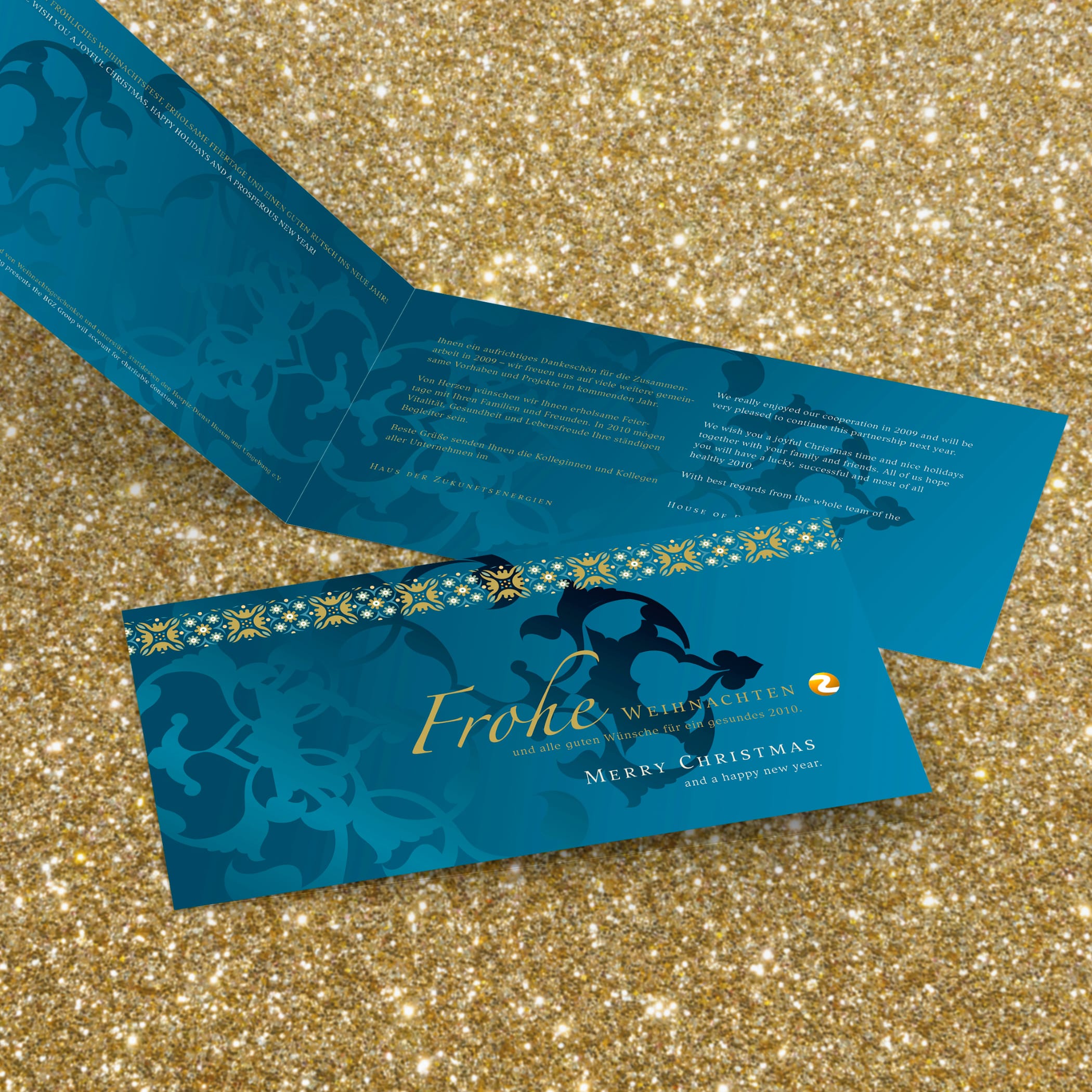 hochzwei_bgz_teaser_07.jpg Blaue Weihnachtskarte vor goldenem Hintergrund