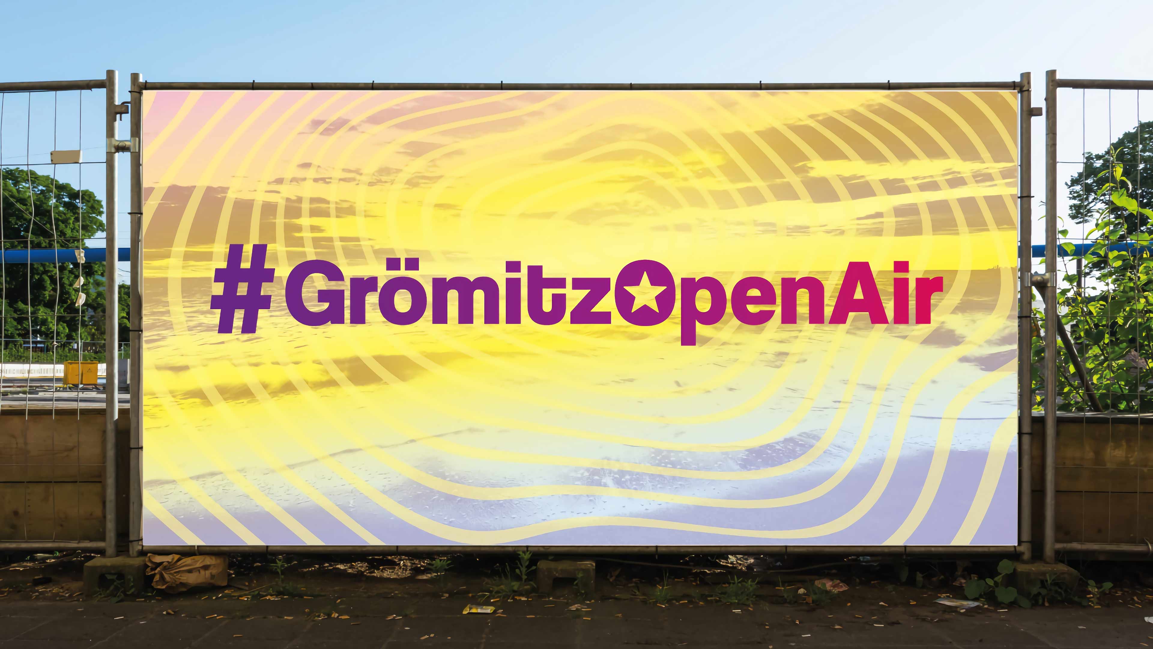 h2_boe_slider_02.jpg Bauzaun mit Banner Grömitz Open Air