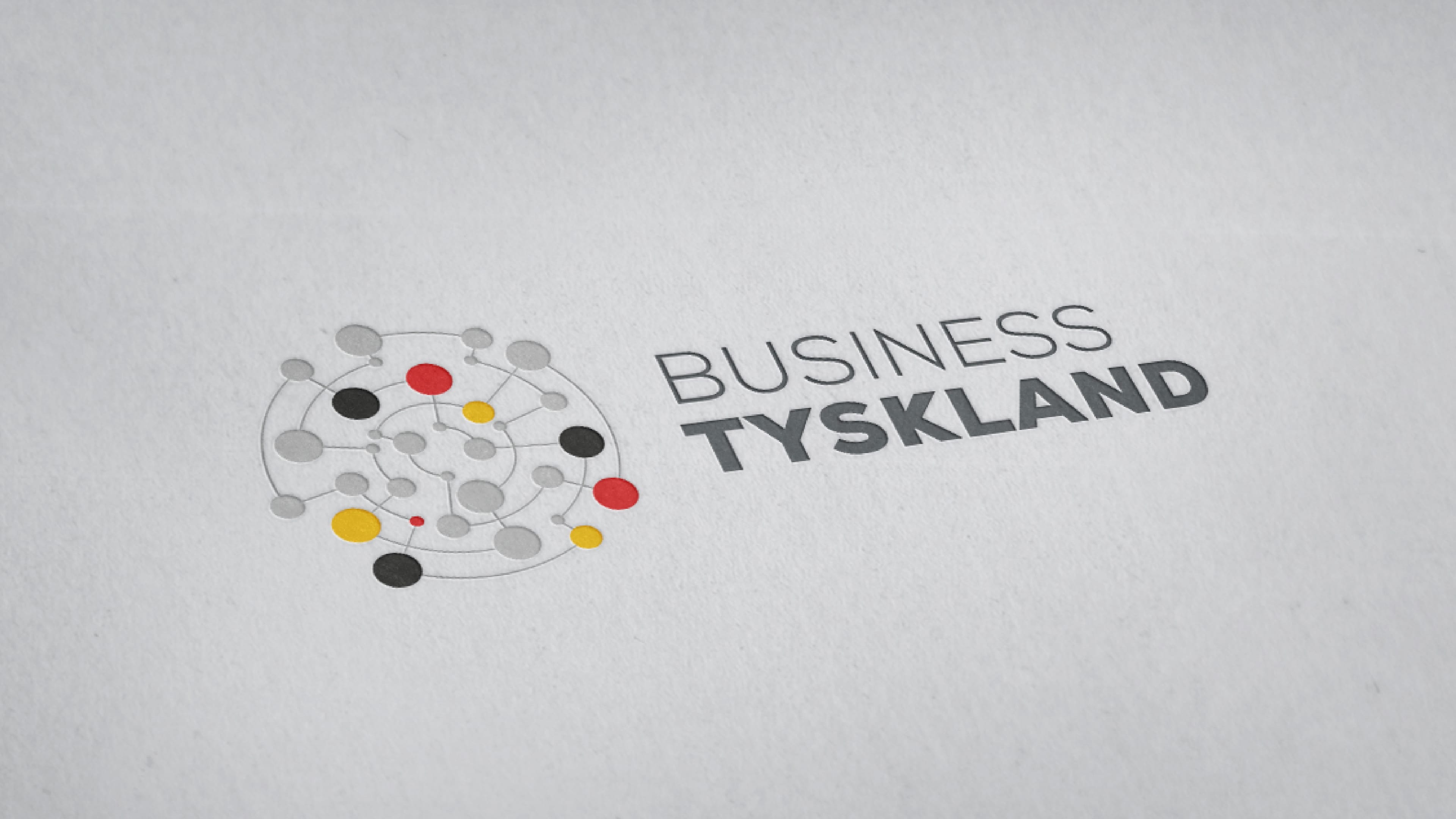 Logo und Schriftzug "Business Tyskland" auf grauem Hintergrund