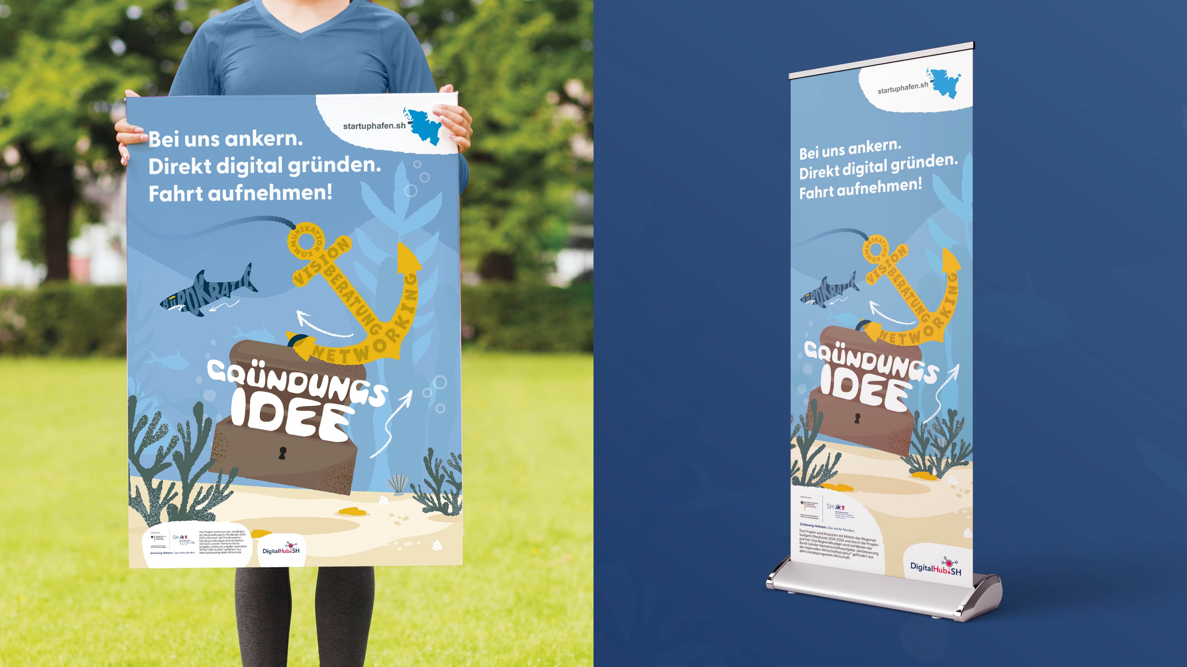 Ein Startuphafen Plakat und eine Werbeaufstellerwand.