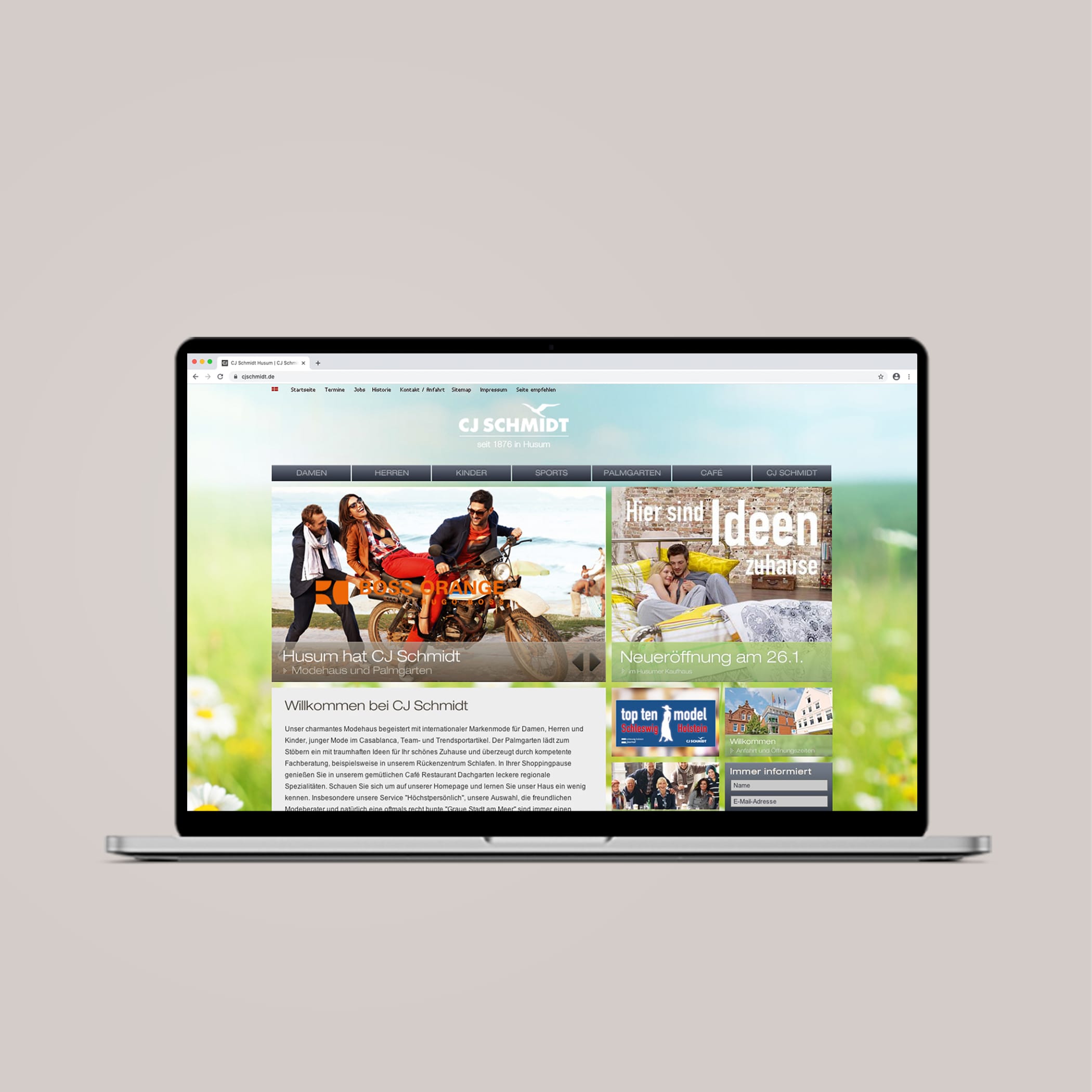 hochzwei_cjsc_teaser_05.jpg Laptop zeigt sommerliche Website von cjschmidt.de