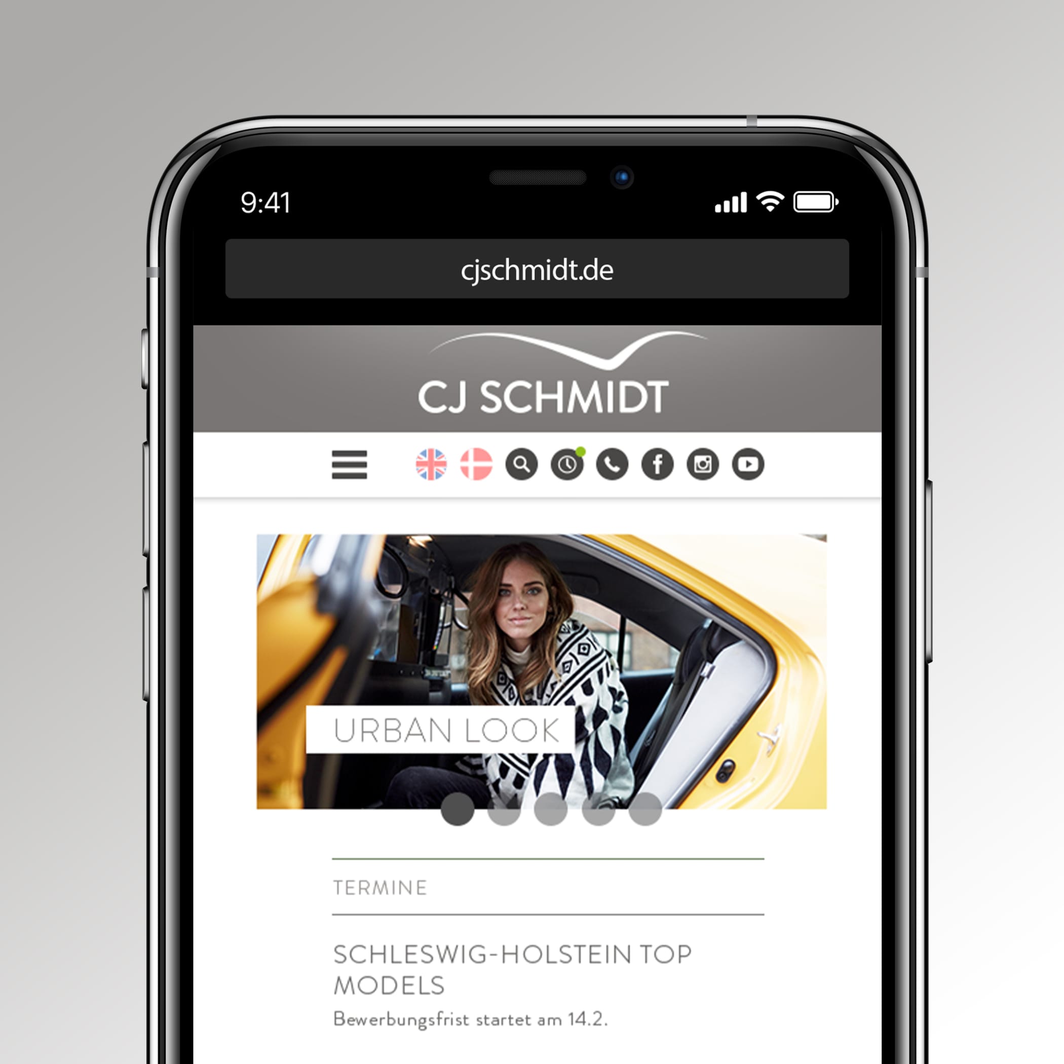 Oberer Teil eines Smartphones, das die mobile Seite von CJ Schmidt zeigt