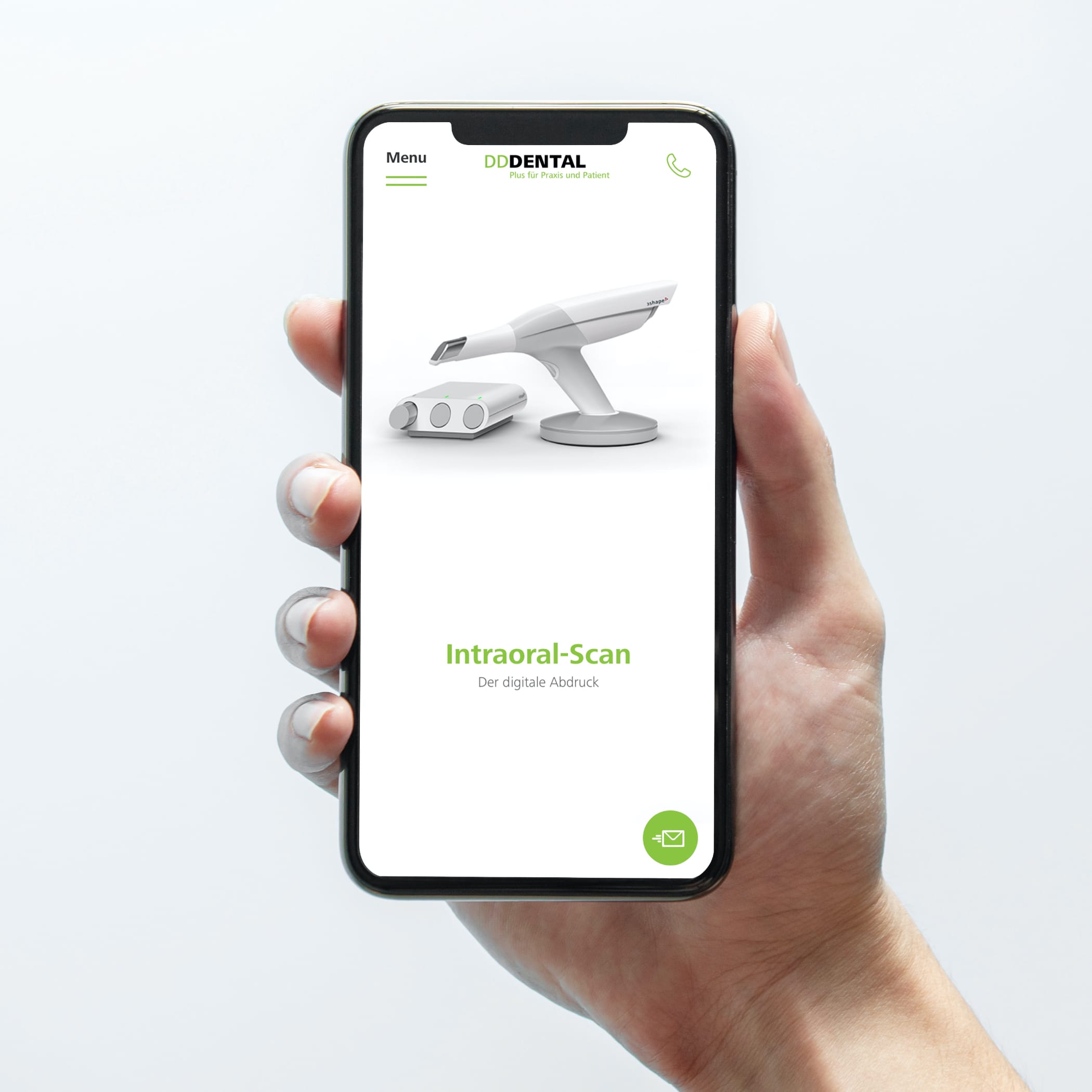 hochzwei_ddd_teaser_05.jpg Hand hält Smartphone, das Website von dd-dental zeigt über Intraoral-Scan