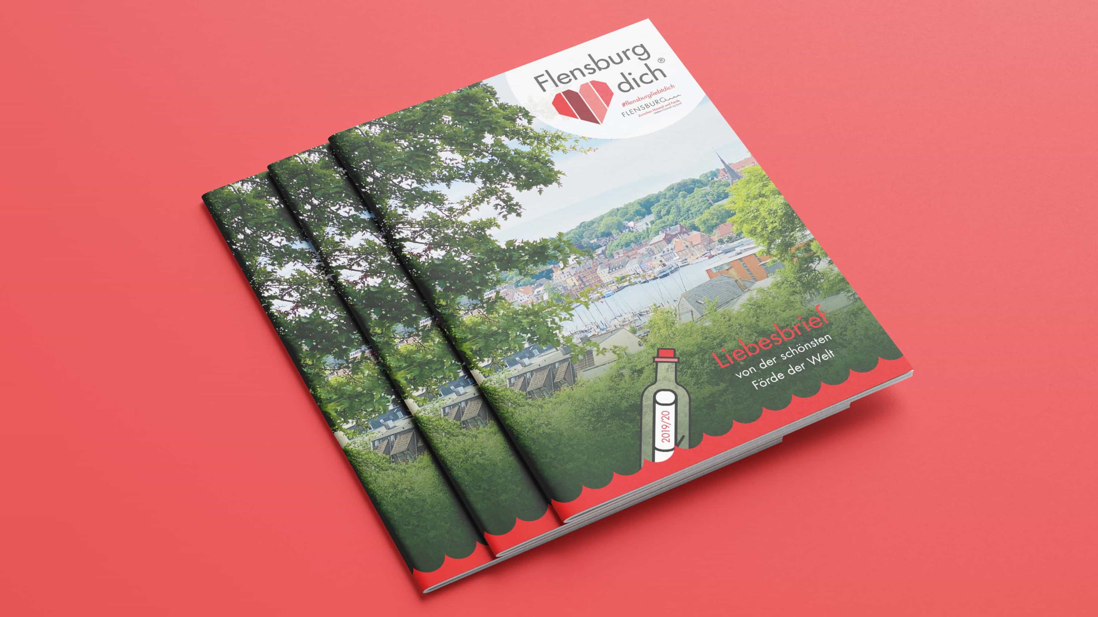 Stapel dreier Broschüren mit Titel "Liebesbrief von der schönsten Förde der Welt"