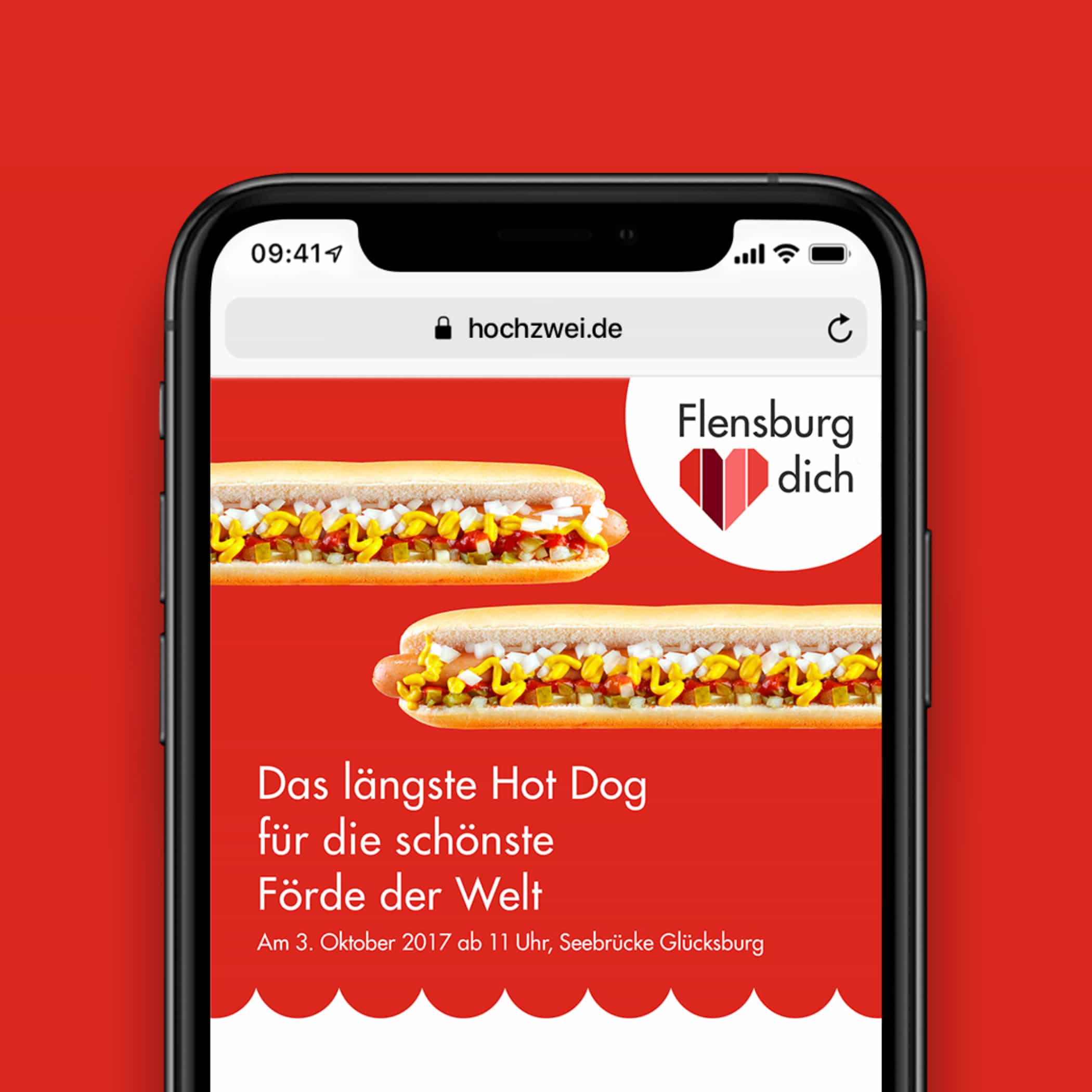 hochzwei_sfdw_teaser_01.jpg Smartphone zeigt Website der Bild und Text über das längste Hotdog für die schönste Förde der Welt