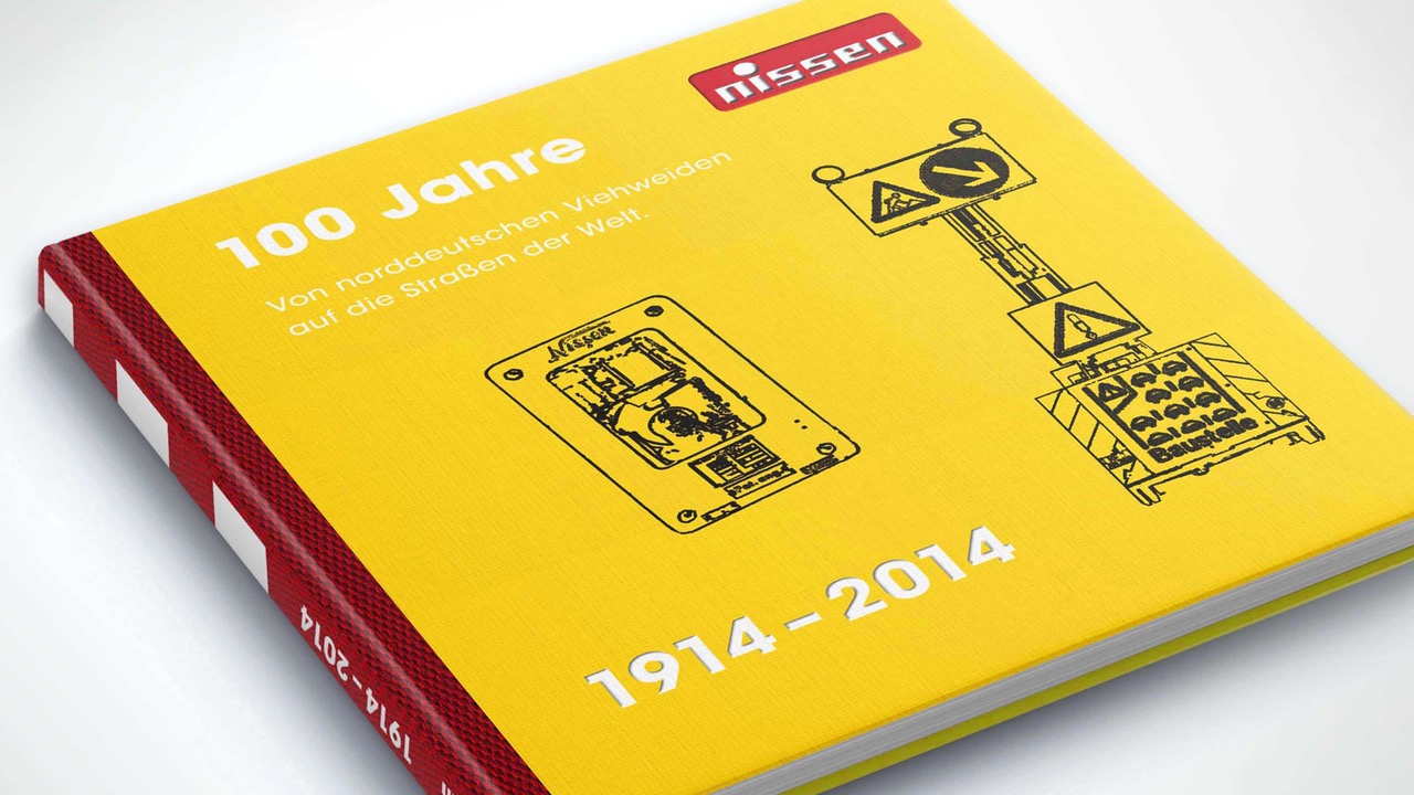 Gelb rotes Firmenbuch von Elektrobau Nissen