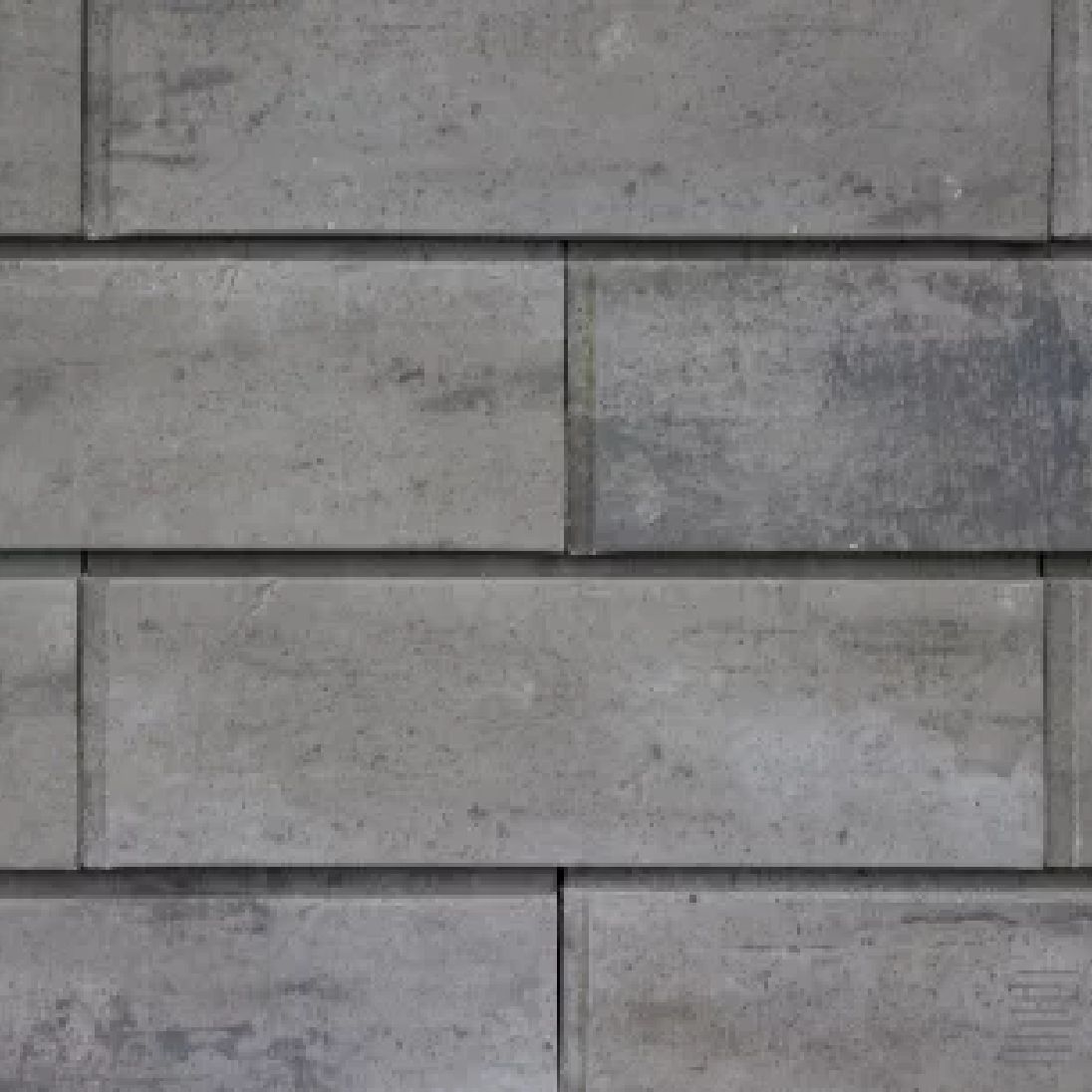 h2_noerre_teaser_05.jpg Graue Klinkersteine in Nahaufnahme.