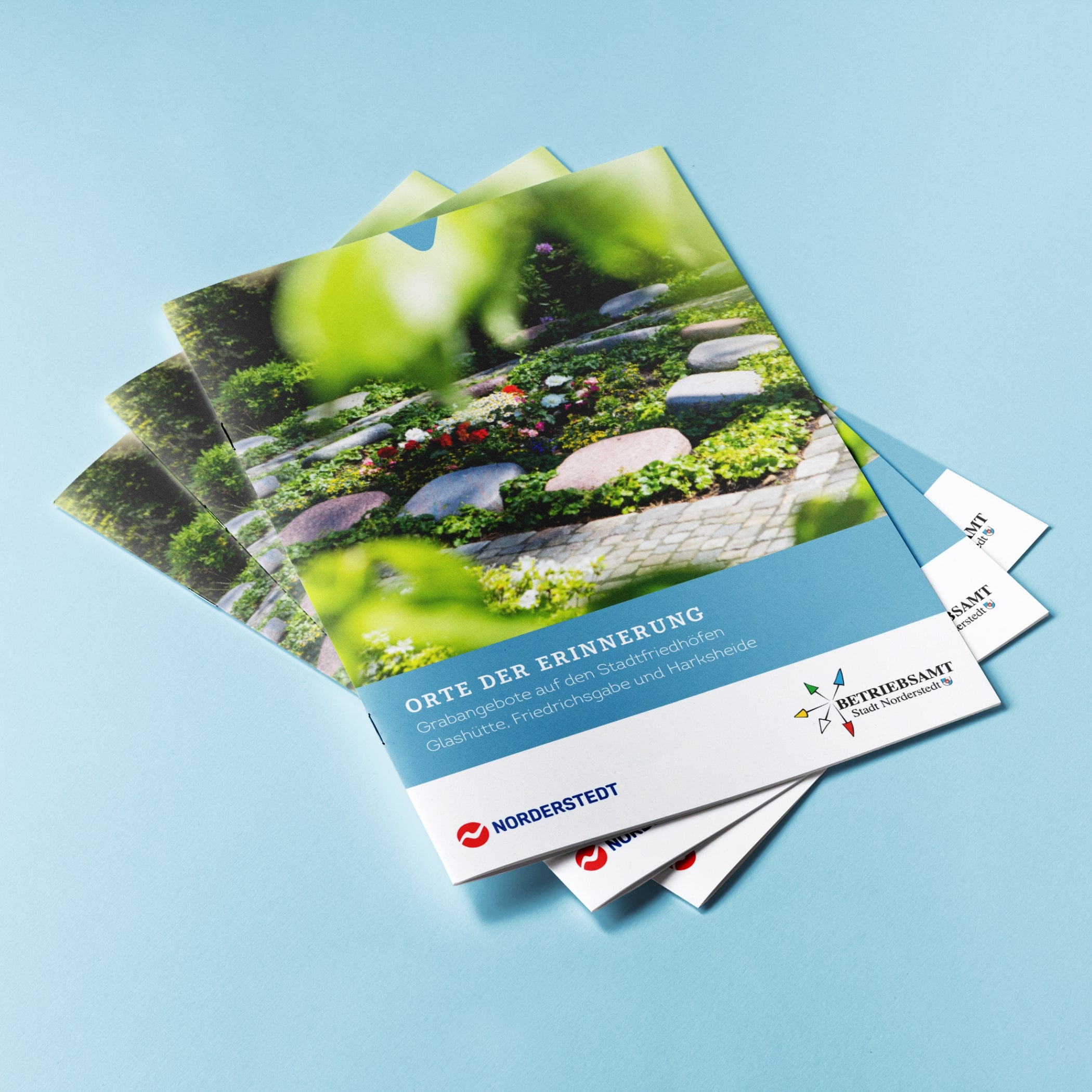 hochzwei_stno_teaser_01.jpg Gestapelte Kataloge von der Stadt Norderstedt