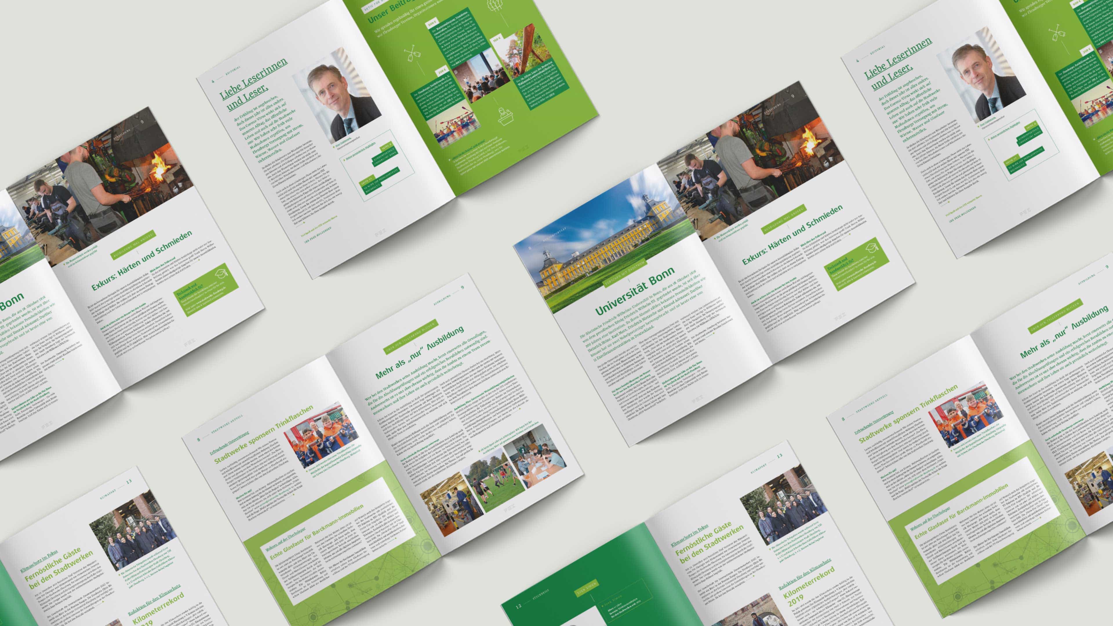 Acht aufgeklappte Stadtwerke Zeitschriften