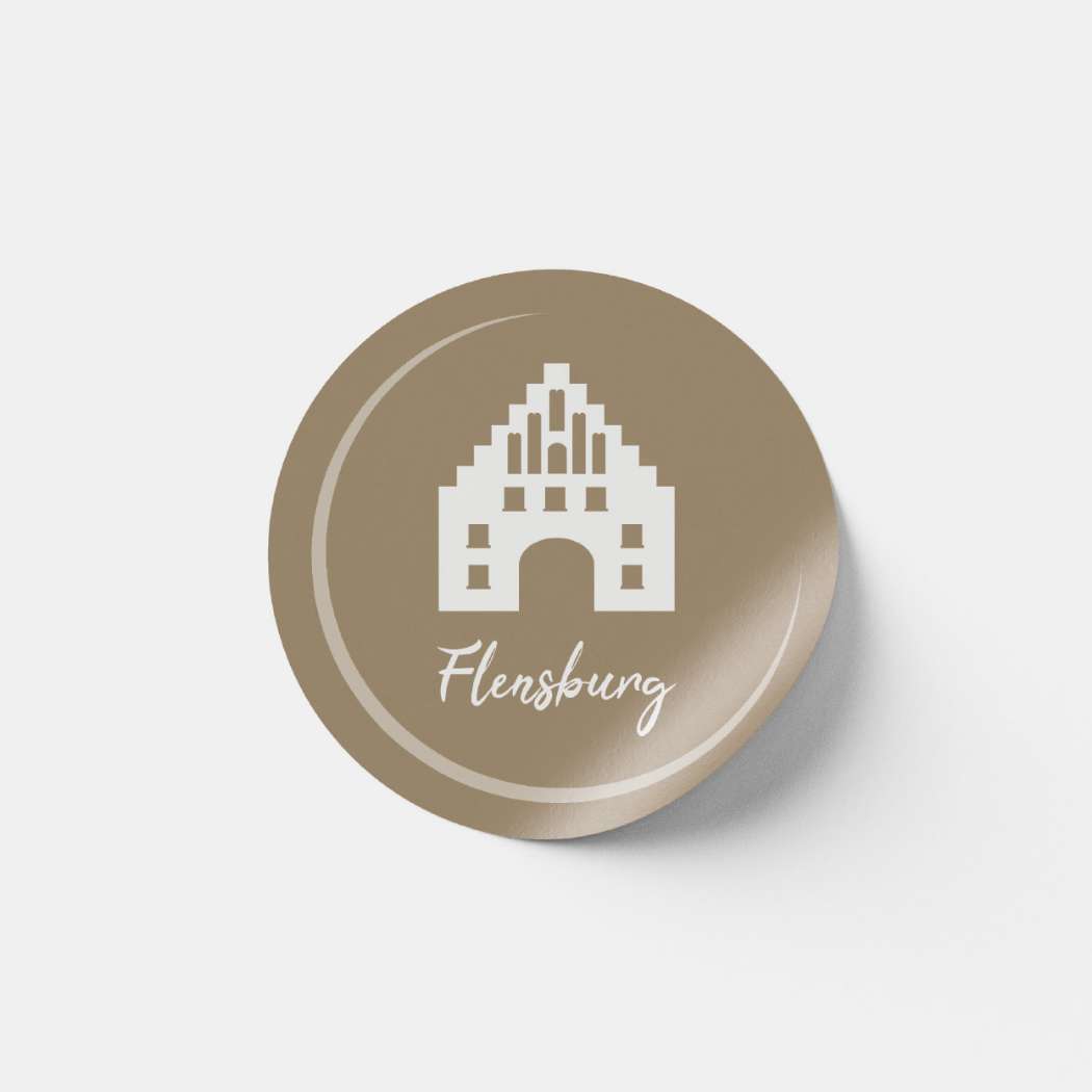 h2_taff_teaser_06.jpg Ein Button mit dem Nordertor