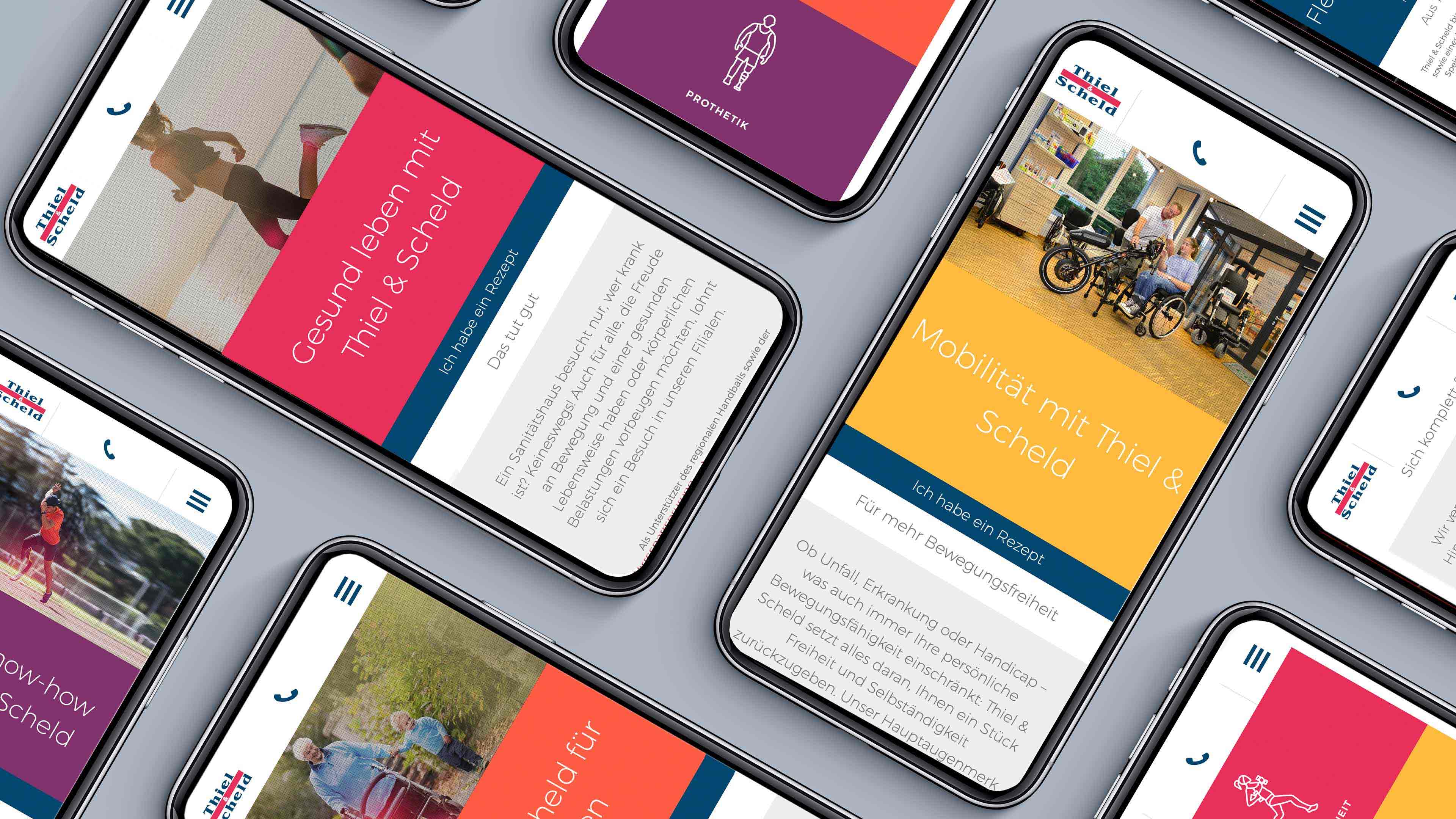Mehrere Handys mit der geöffneten Thiel und Scheld Homepage
