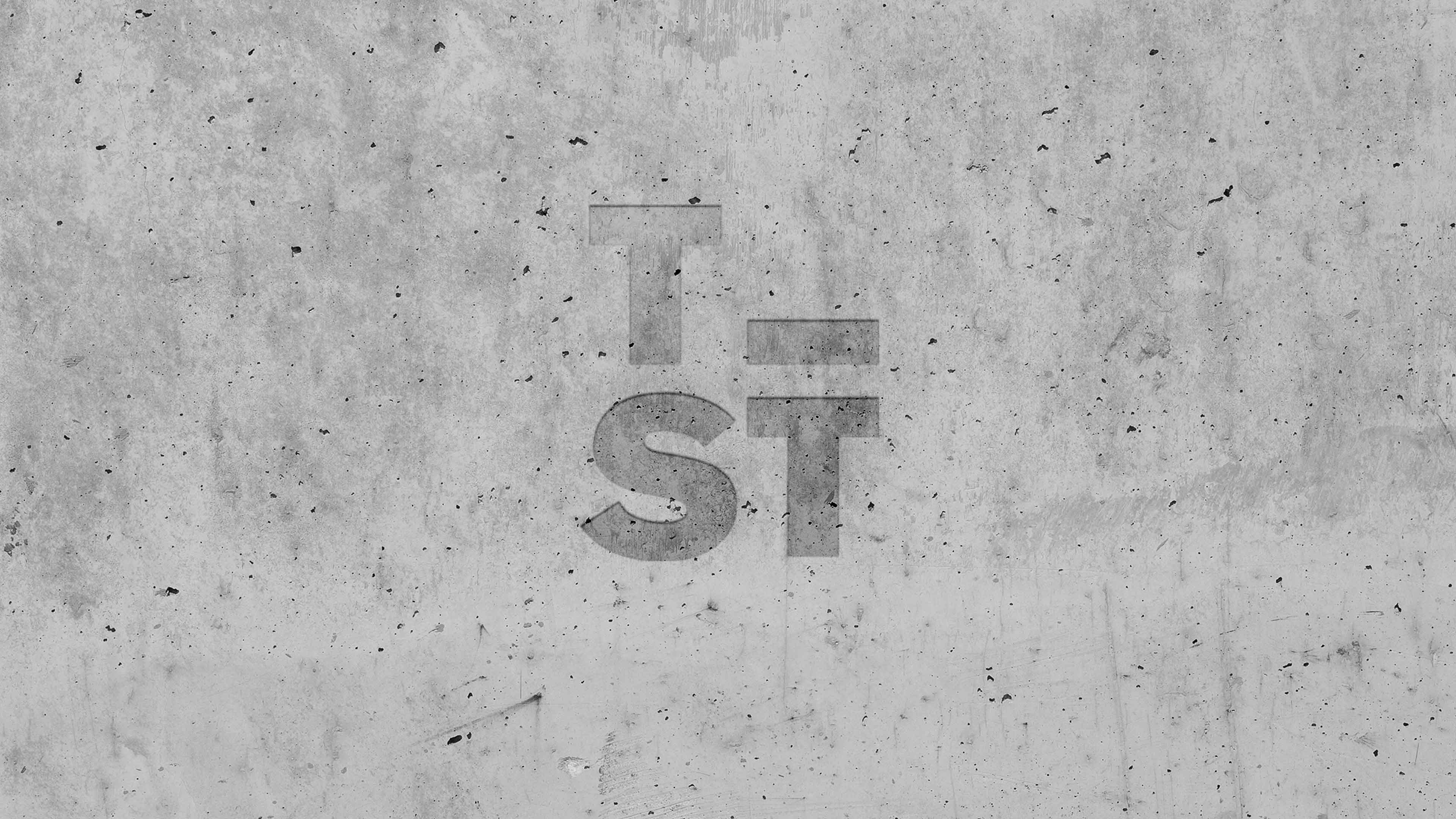Tiefbau Systemtechnik Logo eingemeiselt in Beton