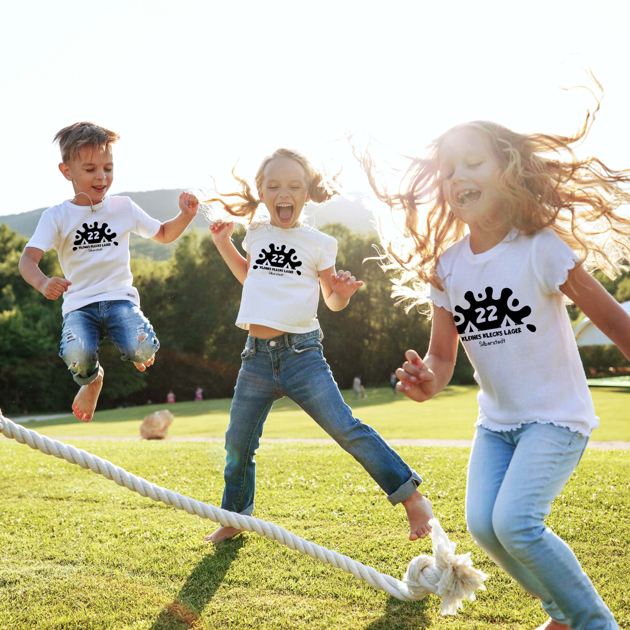 h2_tsv-silberstedt_teaser_01.jpg Drei Kinder spielen mit einem Tau