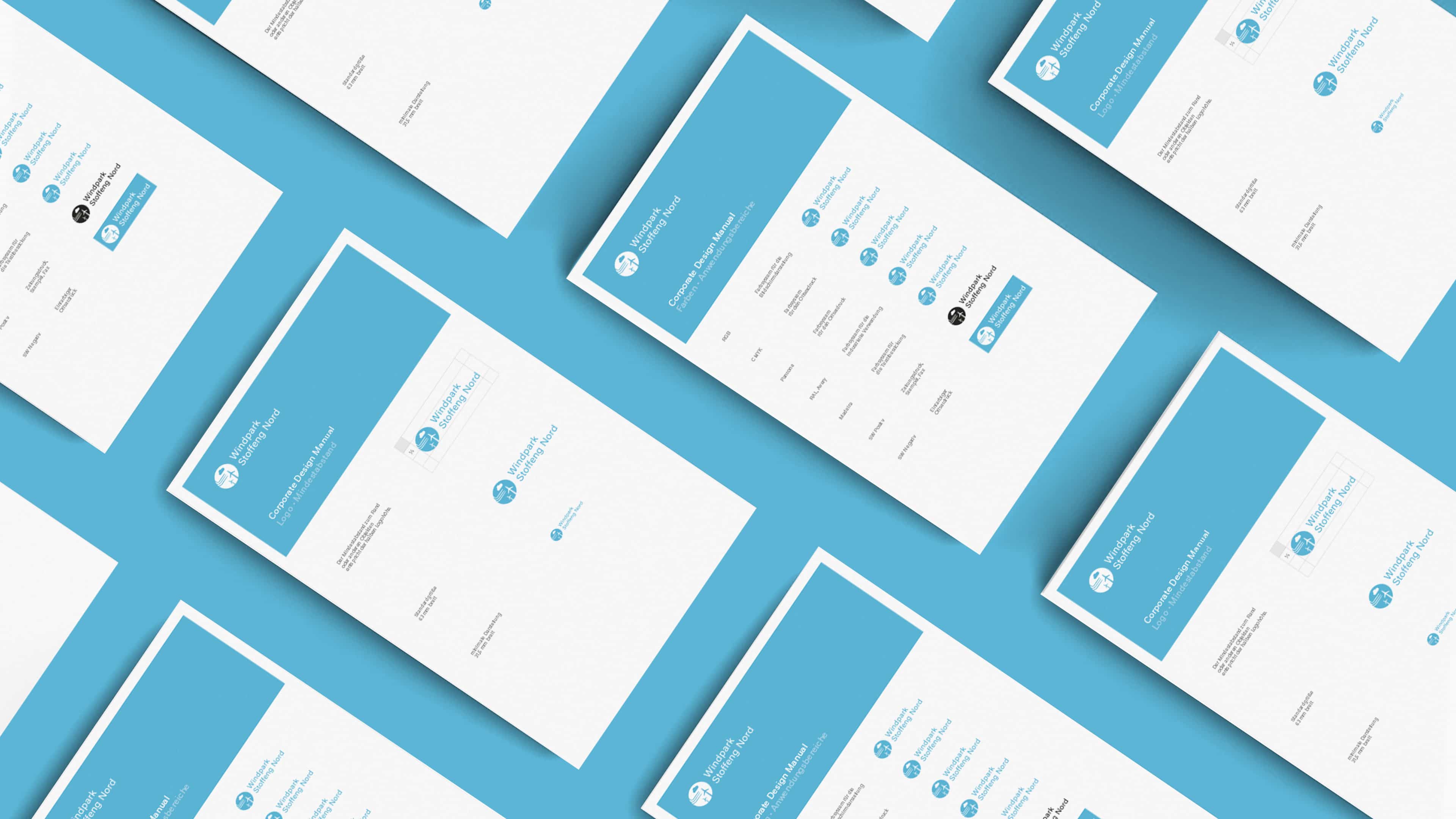 hochzwei_stof_slider_02.jpg Weiße blaue Papiere von Windpark Stoffeng mit Beschriftung