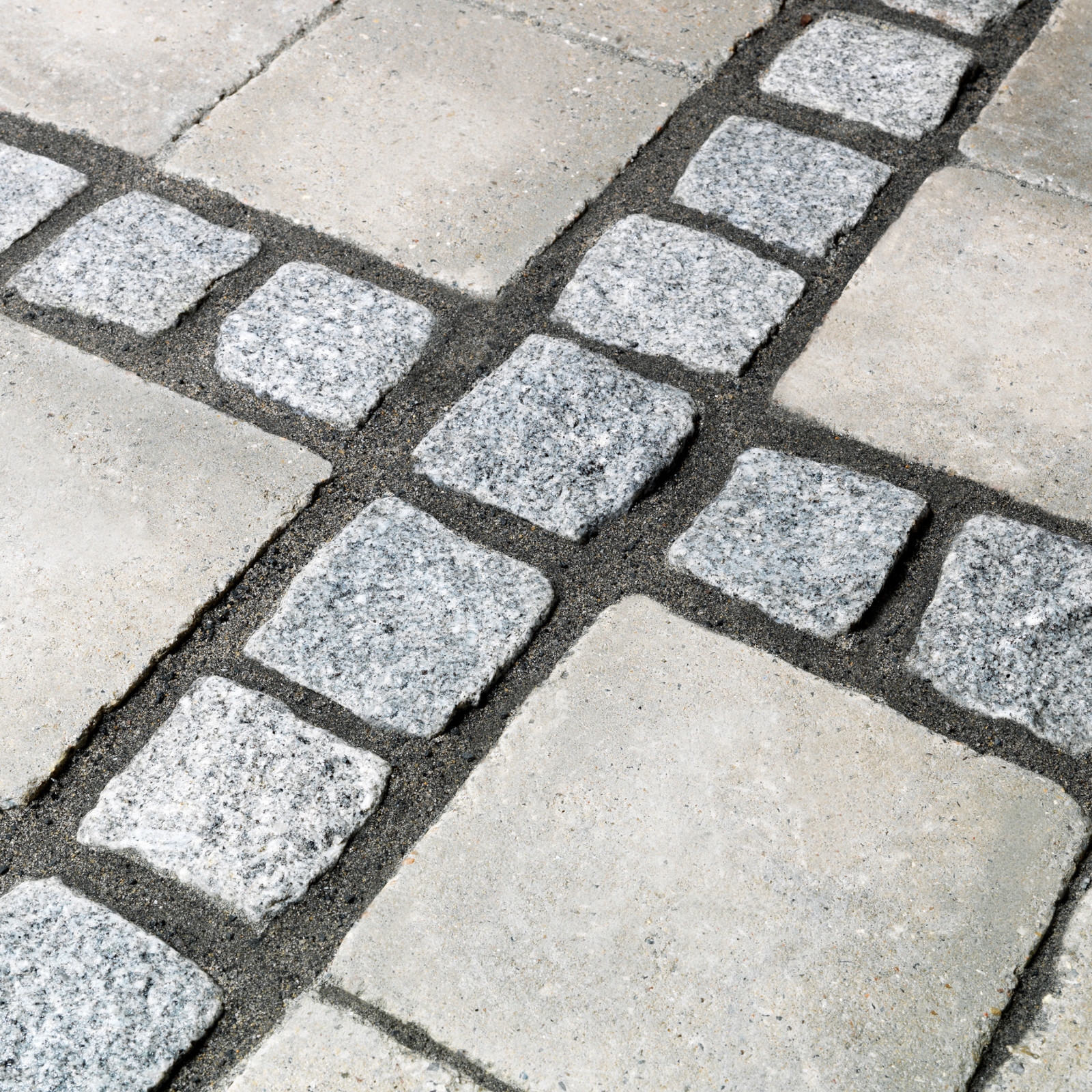 hochzwei_dansand_teaser_04.jpg Pflastersteinkreuz und Gehwegplatten