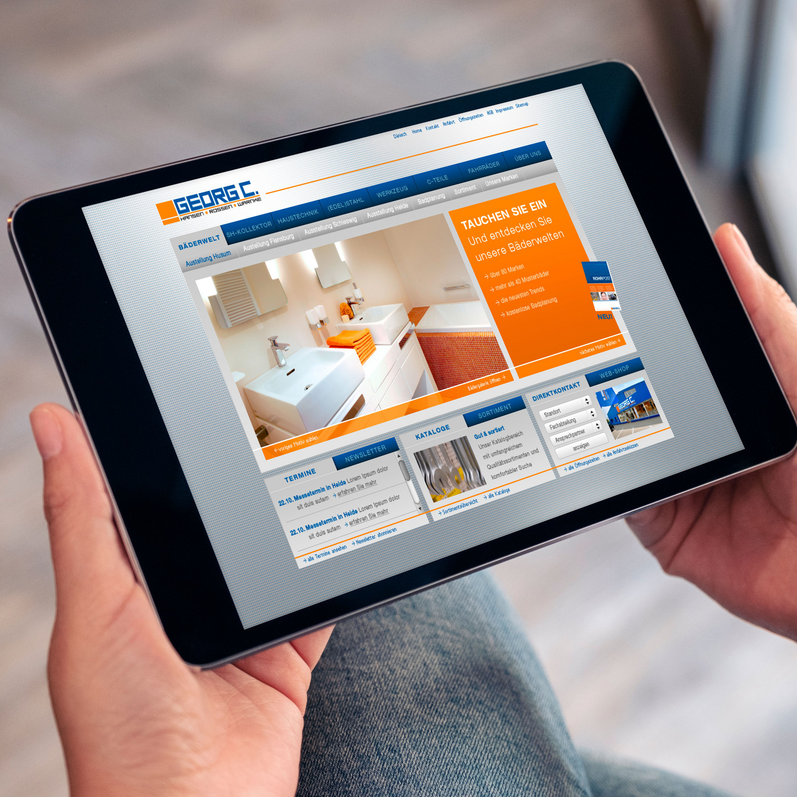 hochzwei_georgc_teaser_02.jpg Eine Person surft mit dem Ipad auf der Georg C Homepage