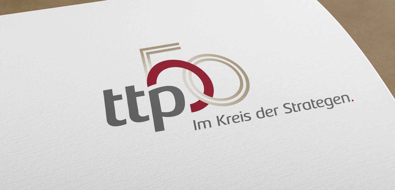 Das ttp Jubiläumslogo auf Papier