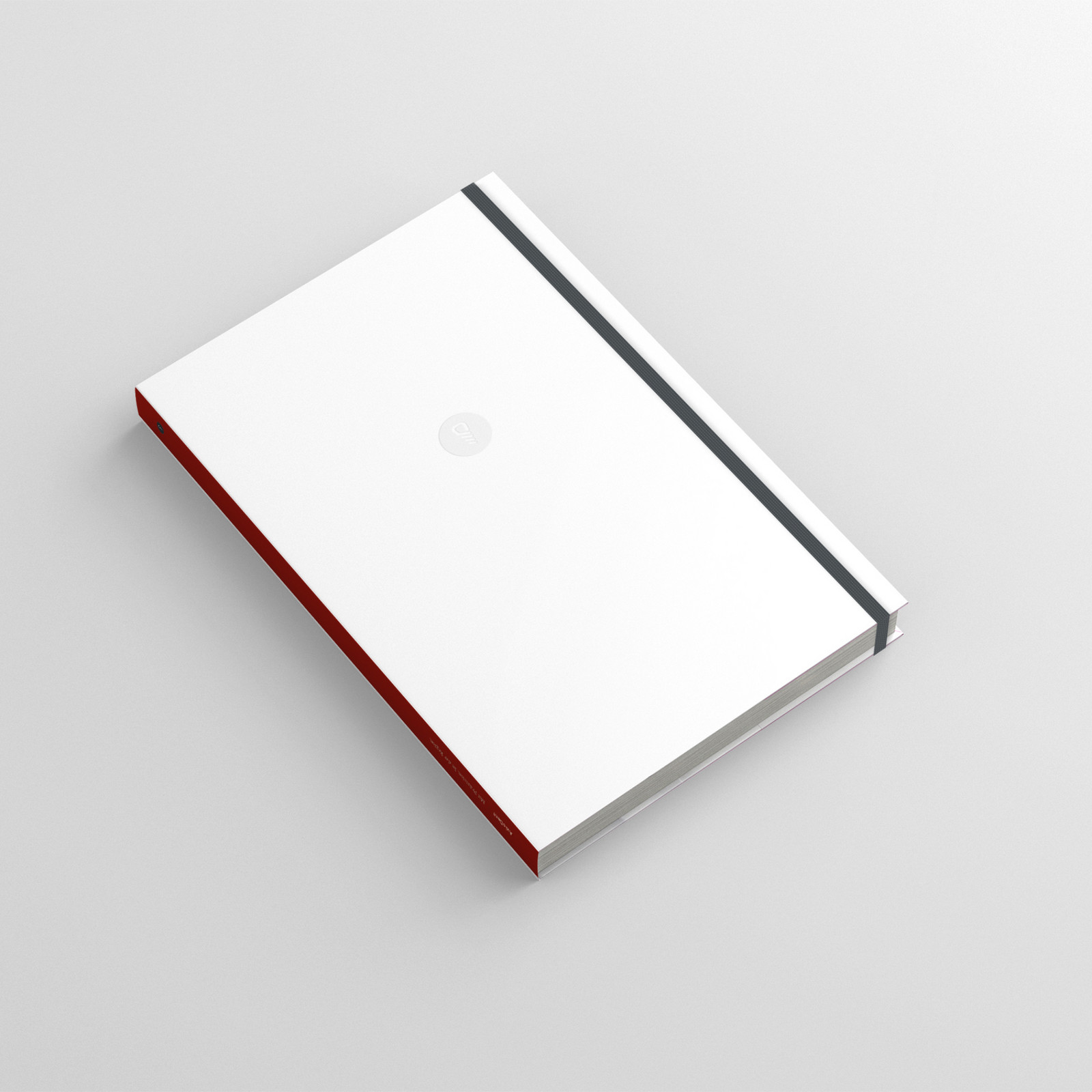 hochzwei_axiodent_teaser_01.jpg Geschlossenes weißes Notizheft mit rotem Rücken und grauem Gummiband