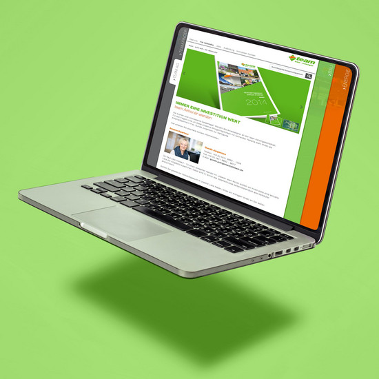 Auf ins Grüne Grauer Macbook mit geöffneter Team Homepage