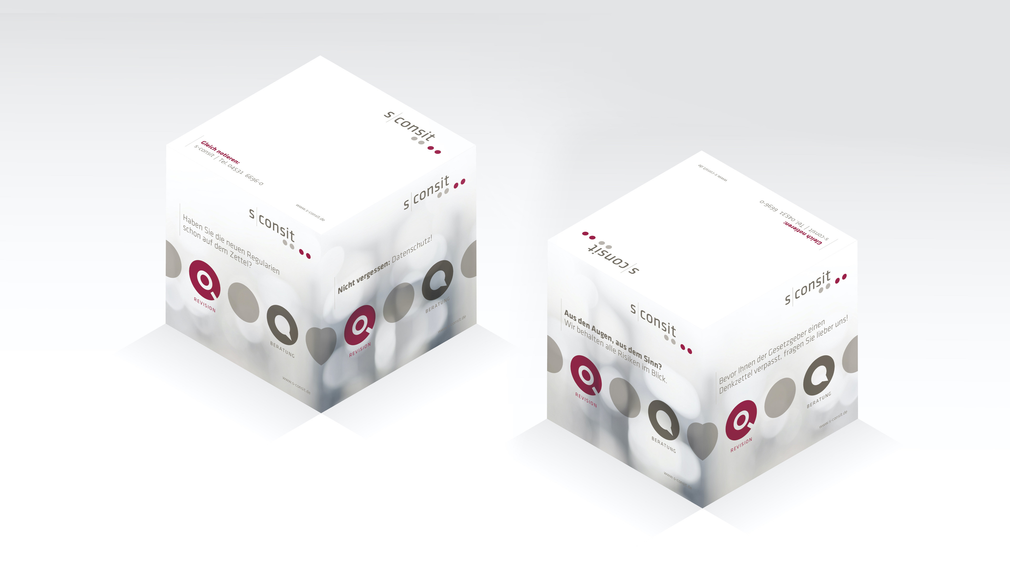 Zwei weiße Blöcke mit Farbpunkten